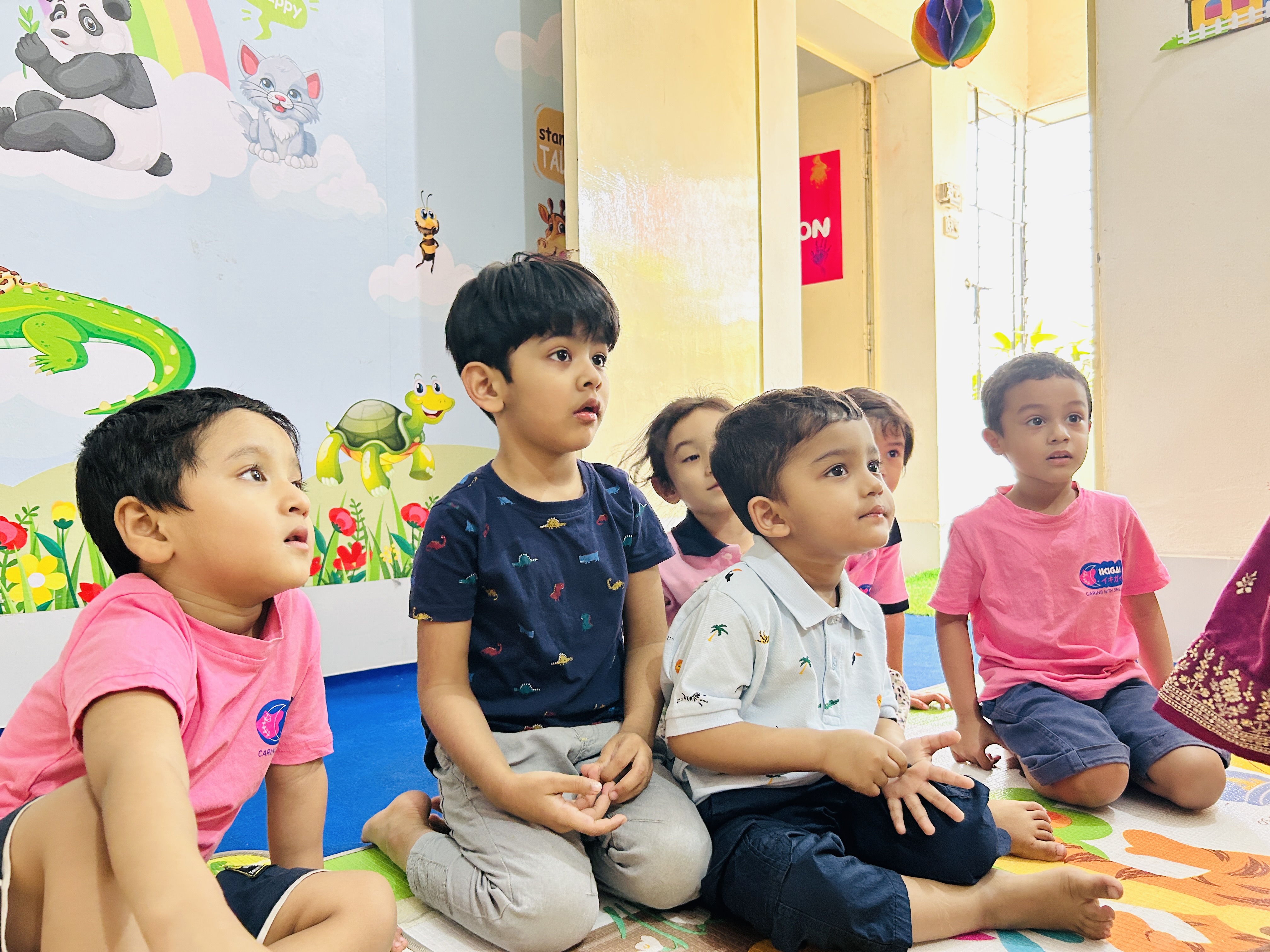 Caring teachers with children